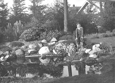 the houses in the back, the clear space? mystery pond! (1936)